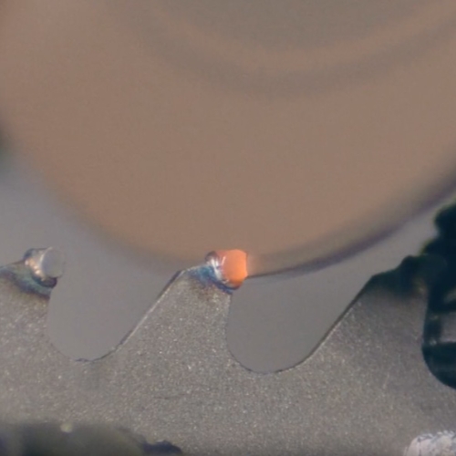 Carbide Tipped Teeth for Alloy Cutting Close-up of a carbide band saw blade's teeth