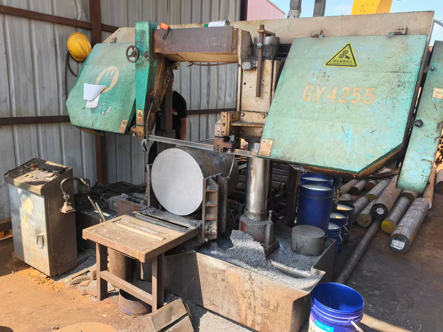 A well-maintained band saw machine in a workshop