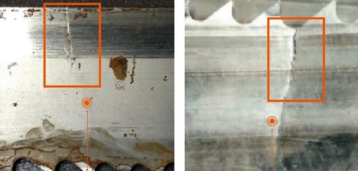 A close-up of a crack in a band saw blade