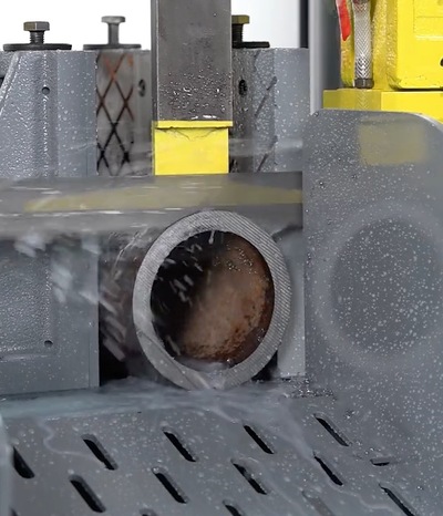 A tension gauge being used on a band saw blade