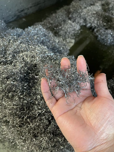 reading band saw chips a pile of different types of metal saw chips