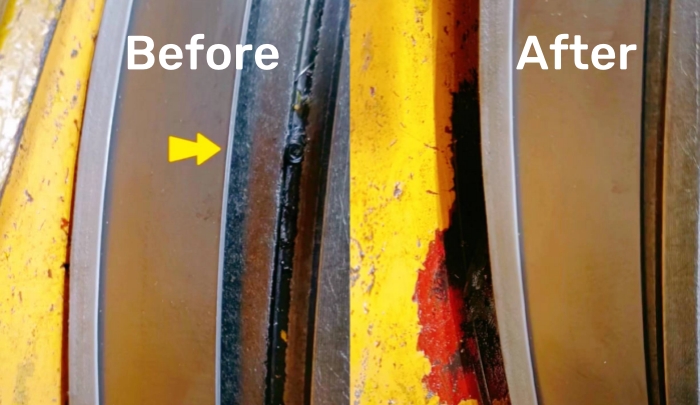 Checking Band Saw Blade Tension A technician inspecting the tension of a new band saw blade